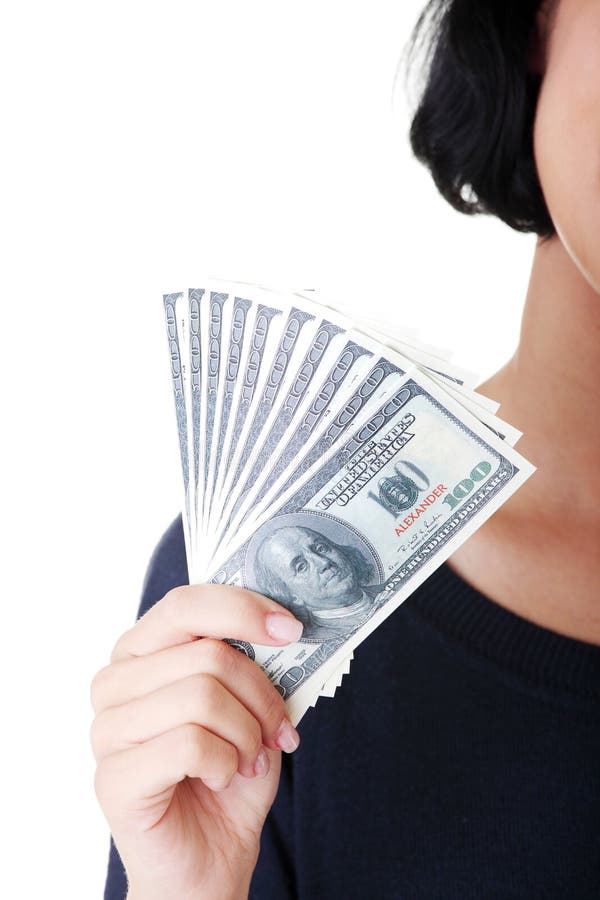 Woman hand with dollars. stock photo