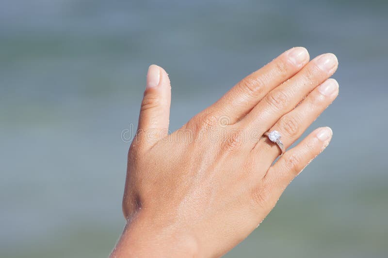Black woman hand with engagement ring Stock Photos - Page 1 : Masterfile