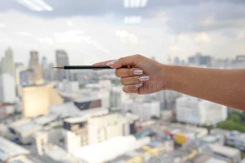 Woman hand hold pencil stock photos