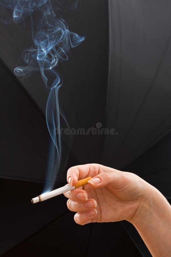 Woman Hand Holding A Cigarette Stock Image - Image of risk, filter