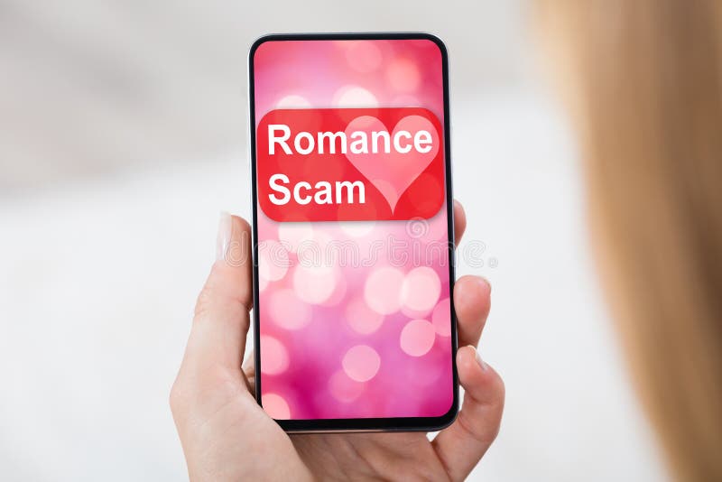 Woman Holding Mobile Phone With Romance Scam Application.