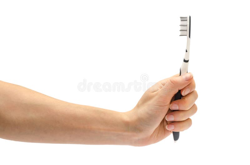 Woman Hand Holding Toothbrush. Stock Photo Image of isolated, hygiene
