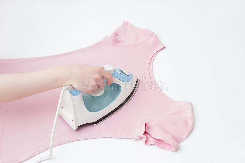 Woman Hand with Iron Ironing Pink Clothes Stock Photo - Image of pink, iron:  130217564