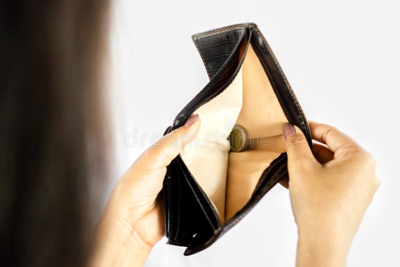 Woman Holds An Empty Purse And Coins In Hand Meaning Money Financial  Problem Or Bankrupt Jobless, Broke After Credit Card Payday Jobless, Debt  Concept. Stock Photo, Picture and Royalty Free Image. Image