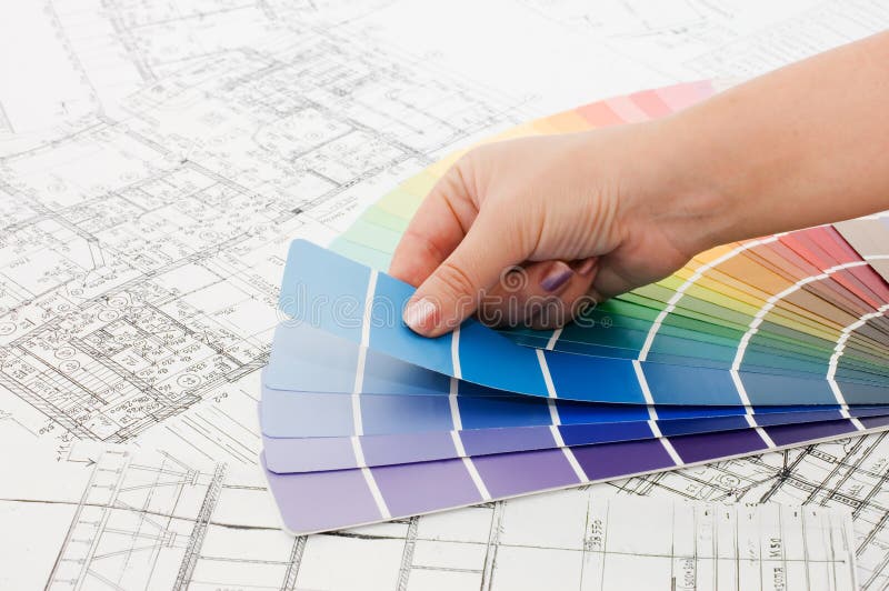 Woman hand pointing to a sample color chart stock photos