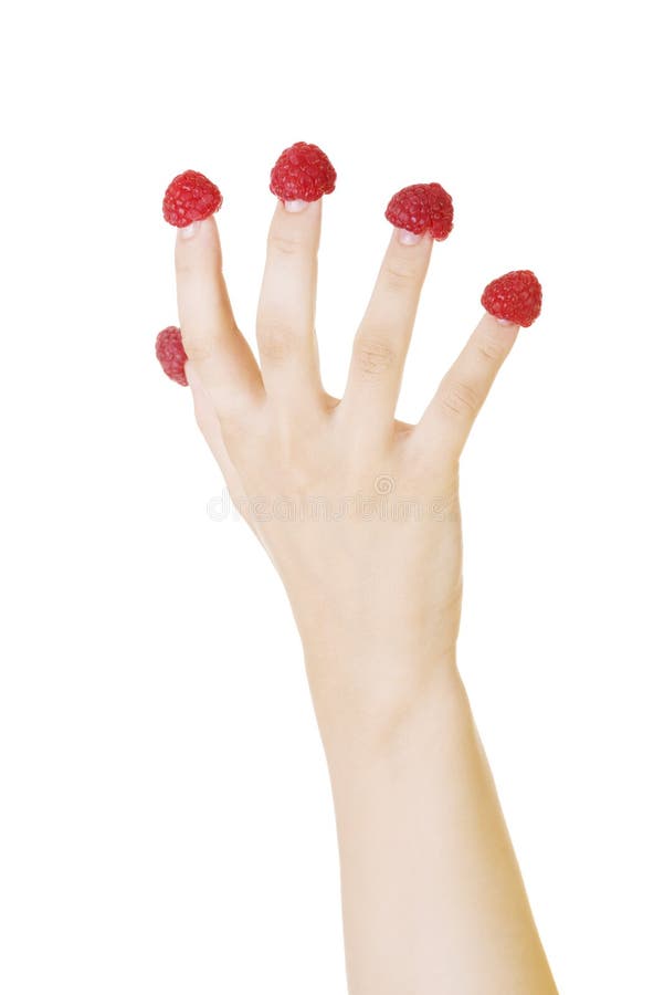Woman hand with raspberries. royalty free stock image