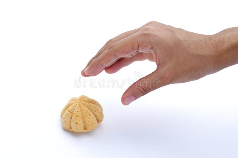 woman hand try to pick a muffin