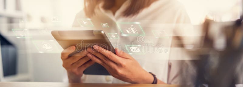 Woman hand using digital tablet and show technology icon social media. Concept social network. royalty free stock photos