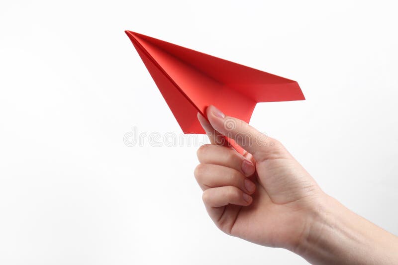 Woman with handmade paper plane on white background closeup fotos de archivo libres de regalías