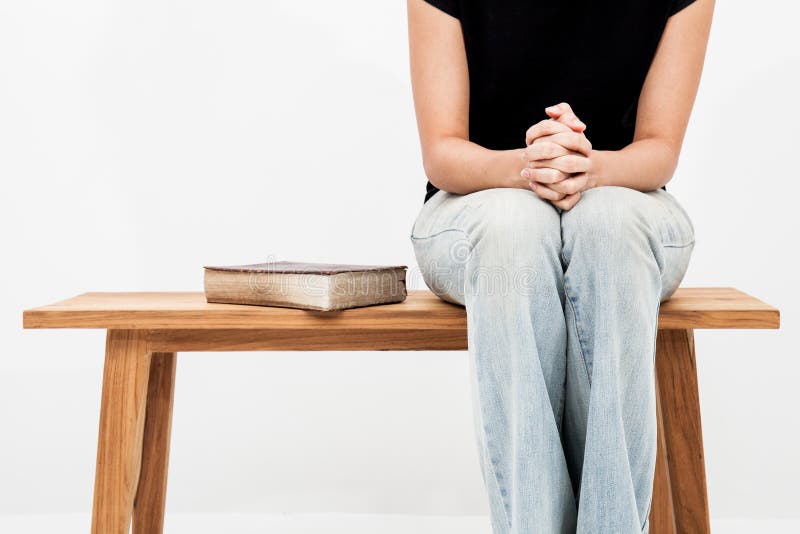 Woman hands on bible. she is reading and praying over bible stock image Woman hands on bible. she is reading and praying over bible stock image