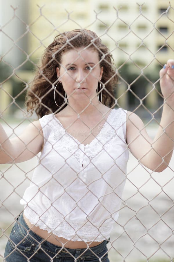 Man Behind a Fence stock photo. Image of link, black, portrait 6094788