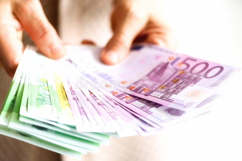 Woman hands holding euro currency money banknotes. Payment and cash concept. Copy space