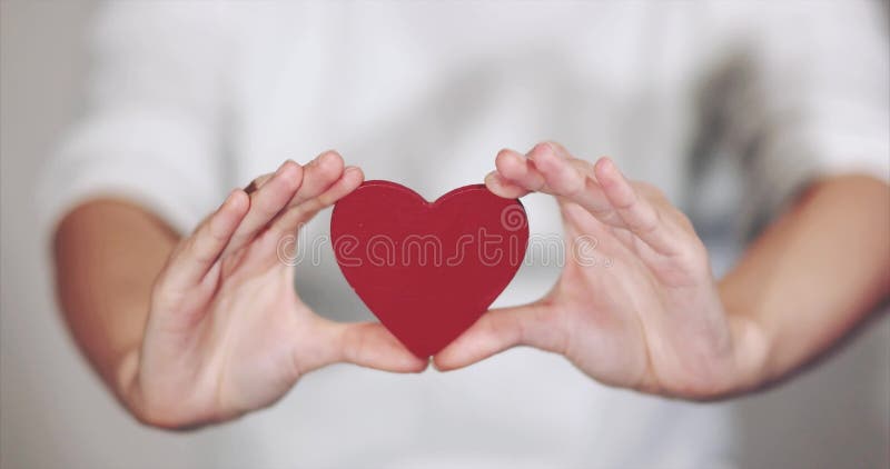 Woman hands holding Heart shape Love and Health symbol stock footage