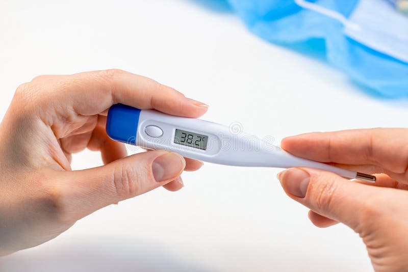 https://thumbs.dreamstime.com/b/woman-hands-holding-medicine-digital-thermometer-high-body-temperature-measurement-light-background-fever-flu-illness-238414489.jpg