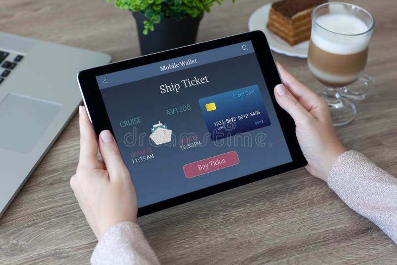 Woman hands holding tablet PC computer with ship ticket stock image Woman hands holding tablet PC computer with ship ticket stock image