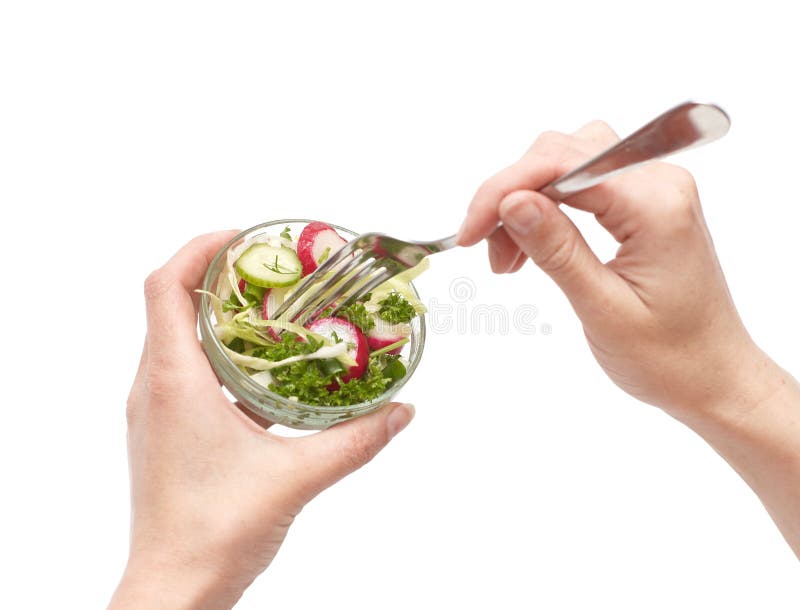 Woman hands with small diet salad and fork