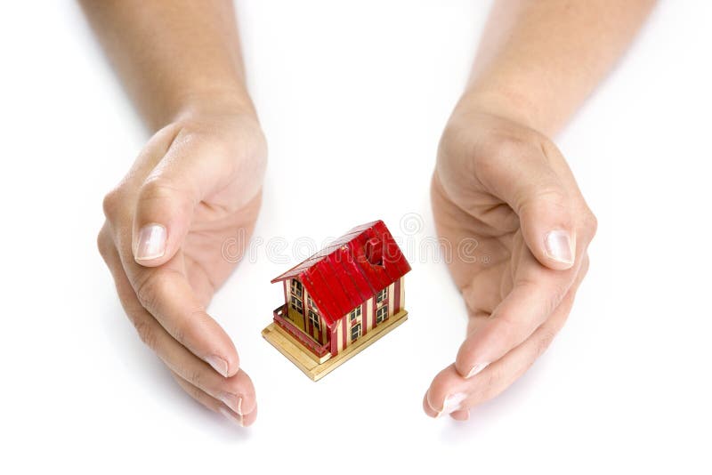 Woman hands with small house - real state concept