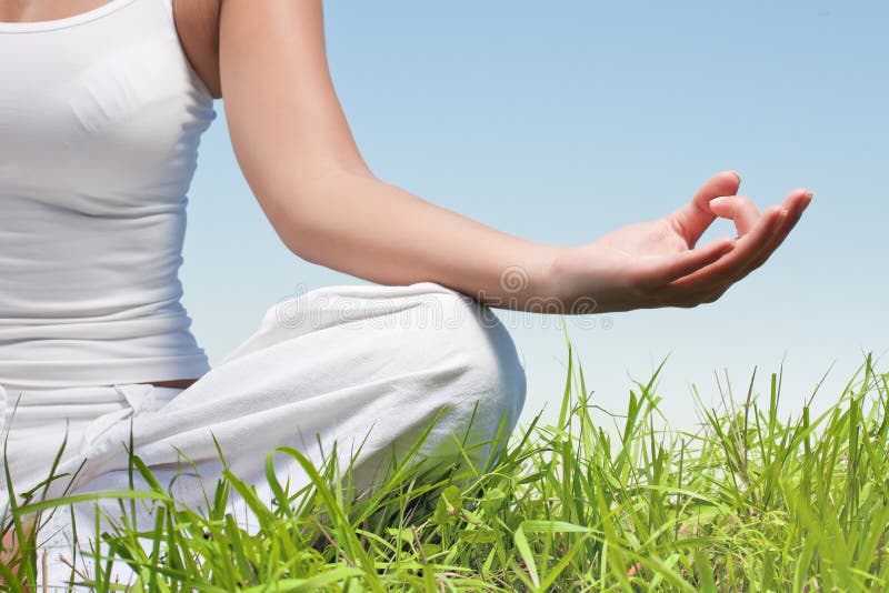 woman hands in yoga meditation pose