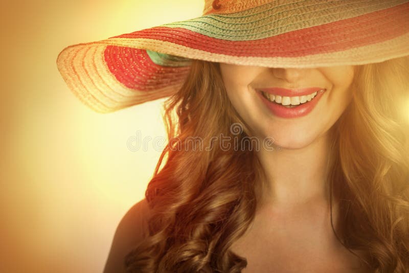 Woman with a hat in the hot summer