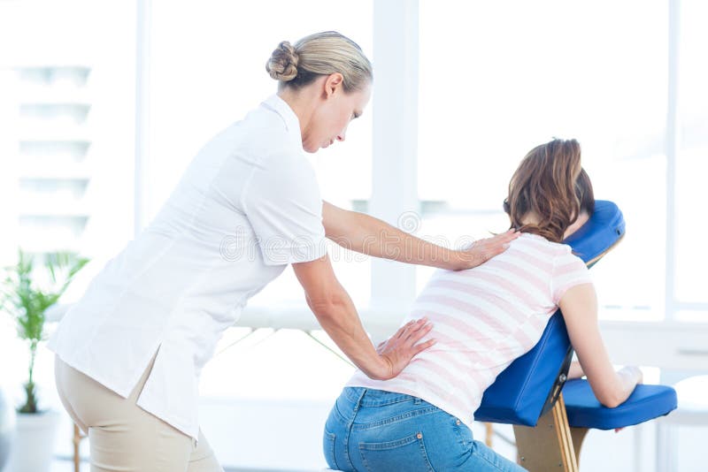 Woman having back massage royalty free stock images Woman having back massage royalty free stock images