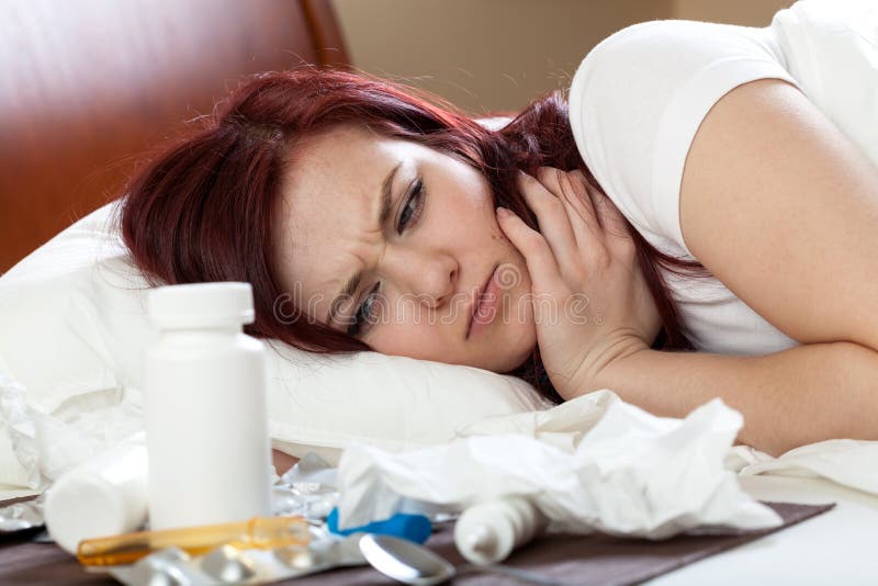 Woman having a cold stock photography