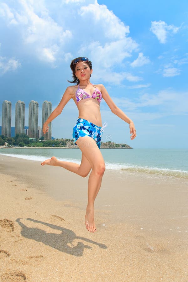 Woman having fun at the beach