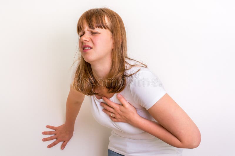 Woman having heart attack stock images Woman having heart attack stock images