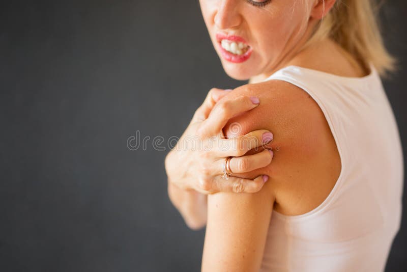 Woman having itchy skin disease