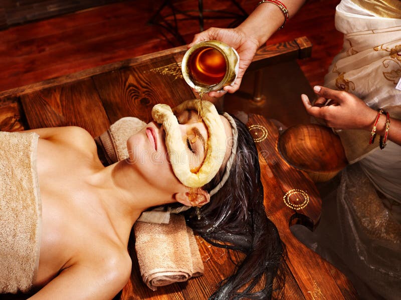Woman having mask at ayurveda spa. stock photo Woman having mask at ayurveda spa. stock photo