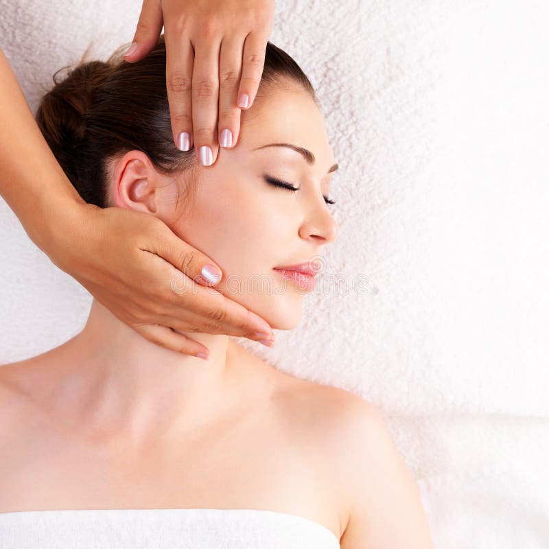 Woman having massage of body in spa salon