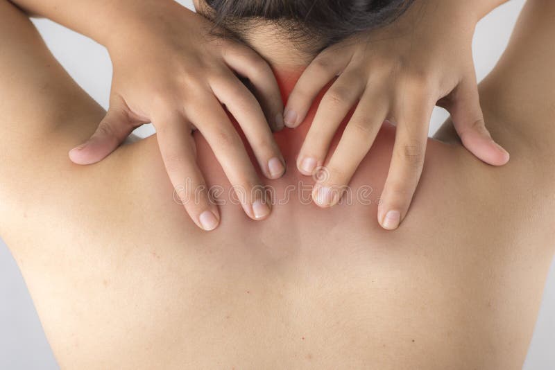 Woman having pain at her neck and back royalty free stock image Woman having pain at her neck and back royalty free stock image