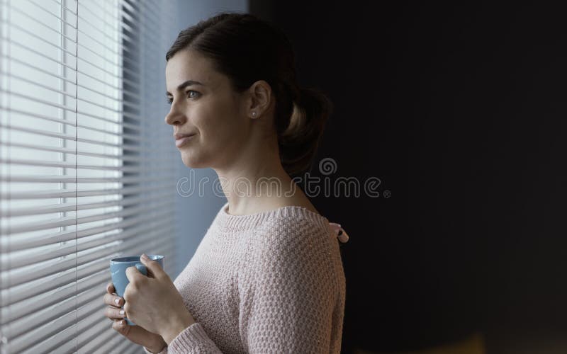 Woman having a relaxing coffee break royalty free stock photos