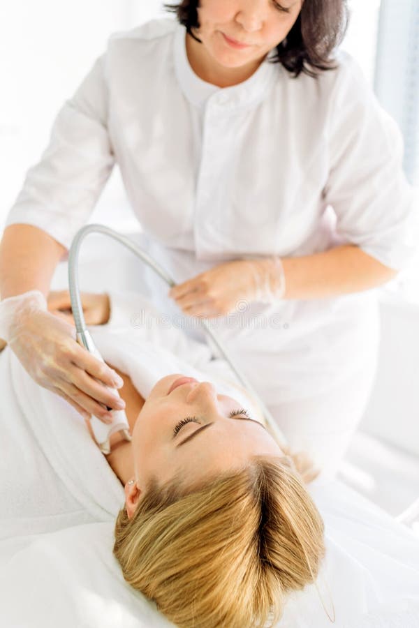 Woman Having A Stimulating Facial Treatment From A Therapist Stock Image Image Of Human