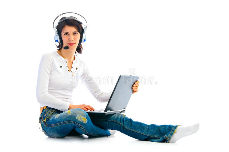 Woman in headphones with laptop