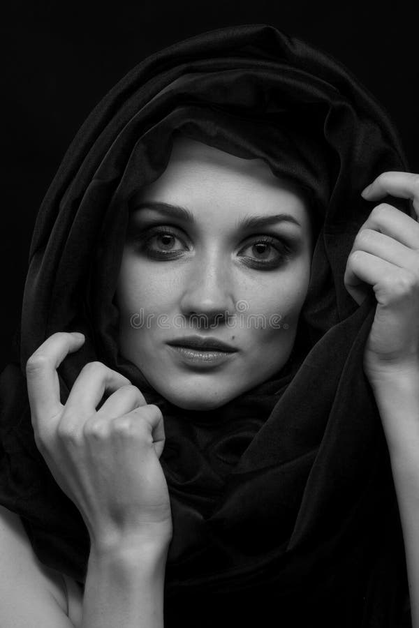Woman with headscarf stock image. Image of monochrome - 246982871