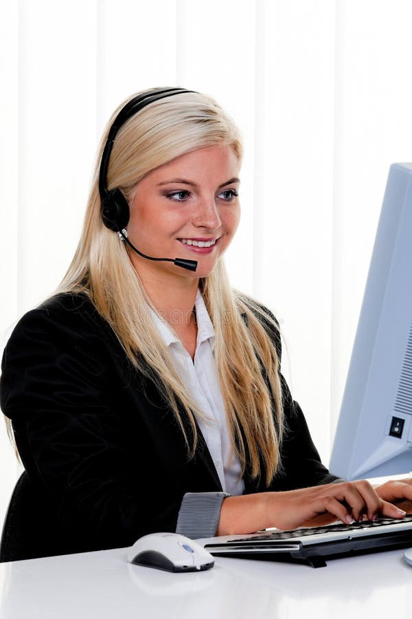 Woman with a headset and computer Hotline