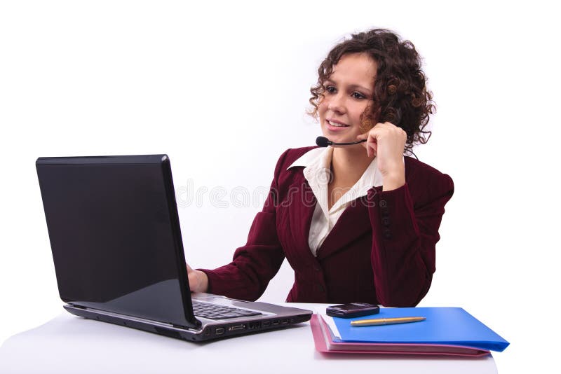 Woman with headset and laptop