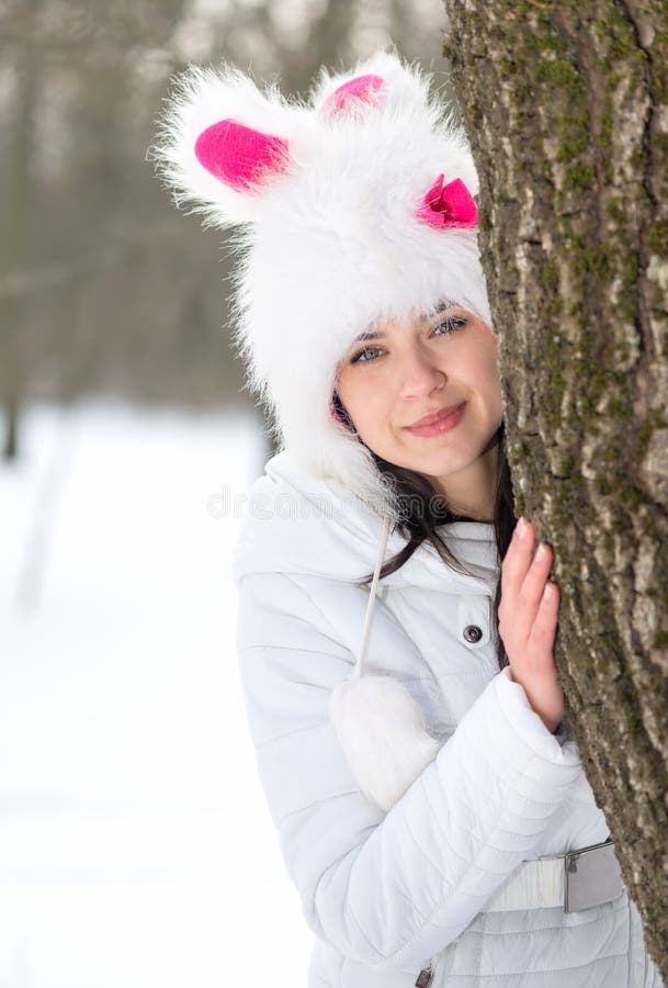 Woman Hiding Behind Tree in Winter Stock Image Image of beauty, smile