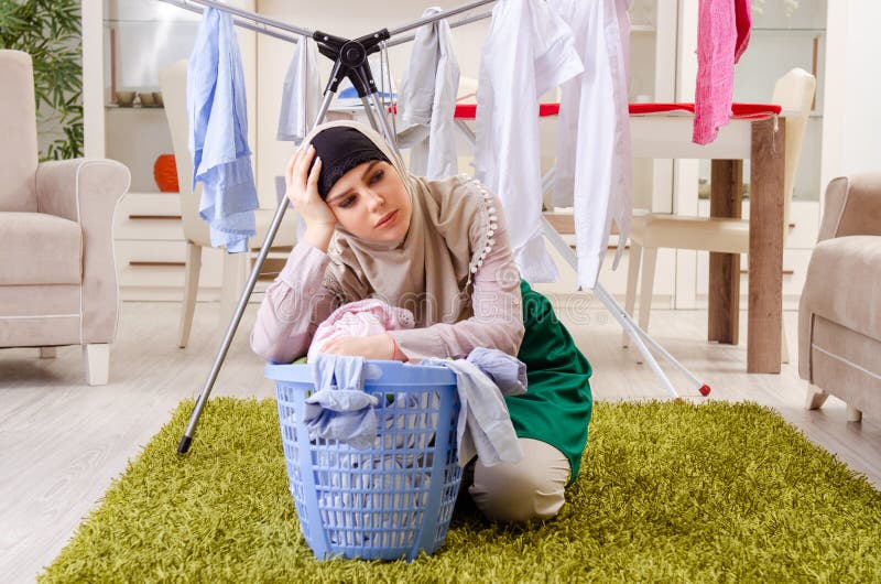 Woman In Hijab Doing Clothing Ironing At Home Stock Image Image Of