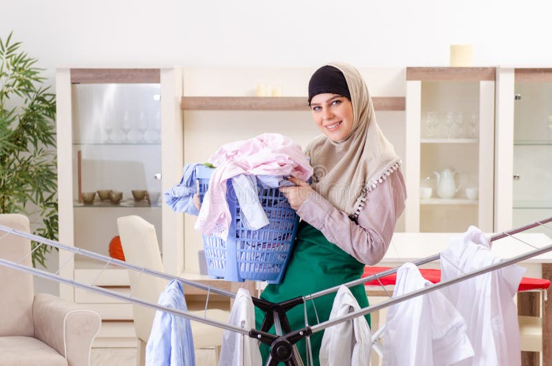 Woman In Hijab Doing Clothing Ironing At Home Stock Image Image Of