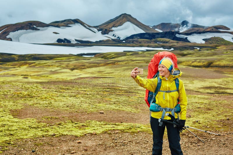 Woman hiker photographer