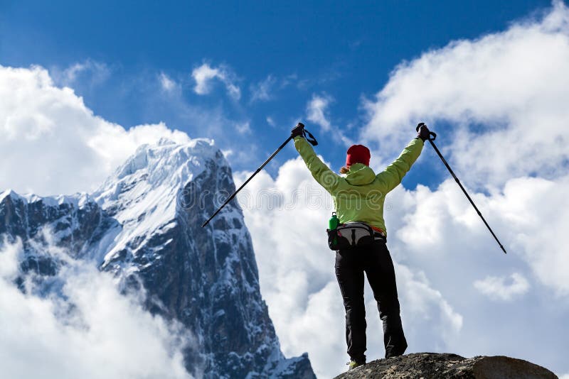 Woman hiker walking in Himalaya Mountains, Nepal