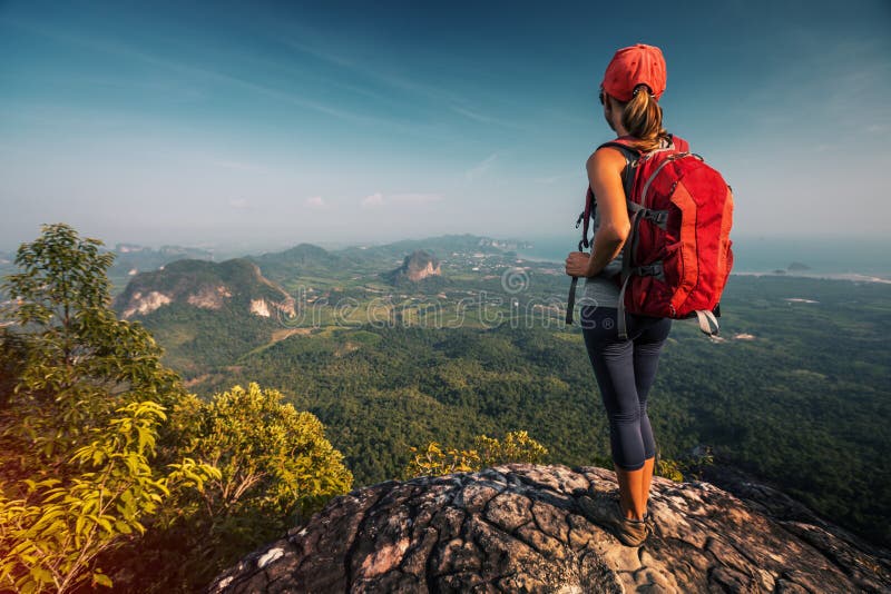Woman hiker stock photo. Image of crag, horizon, freedom - 134004856