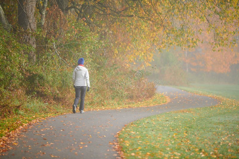 Woman hiking at autumn foggy day royalty free stock image Woman hiking at autumn foggy day royalty free stock image