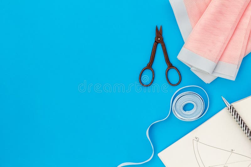 Woman Hobby. Set for Tailor Shop with Thread, Scissors, Fabric on Blue  Background Top View Copy Space Stock Image - Image of female, needle:  134738985