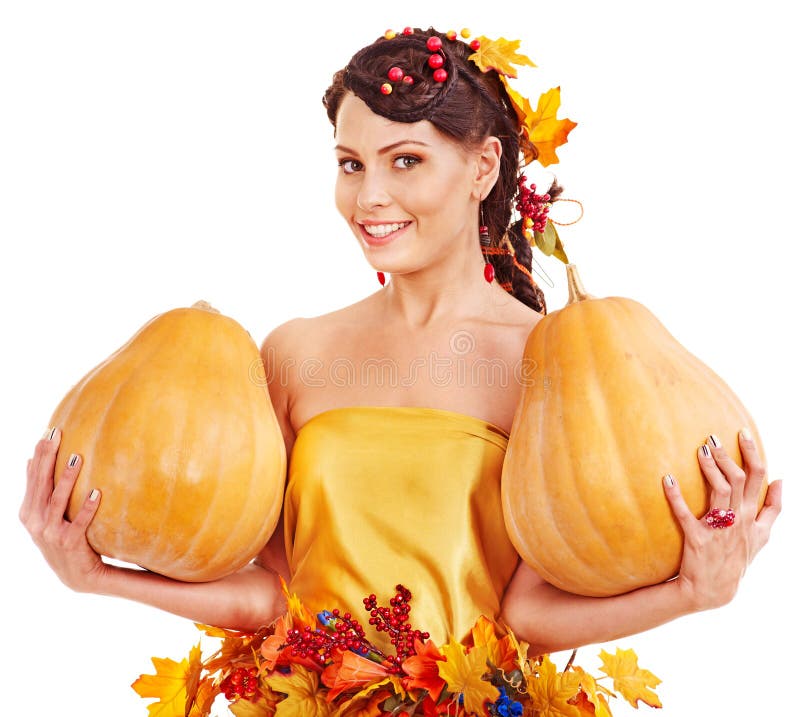 Woman holding autumn pumkin.