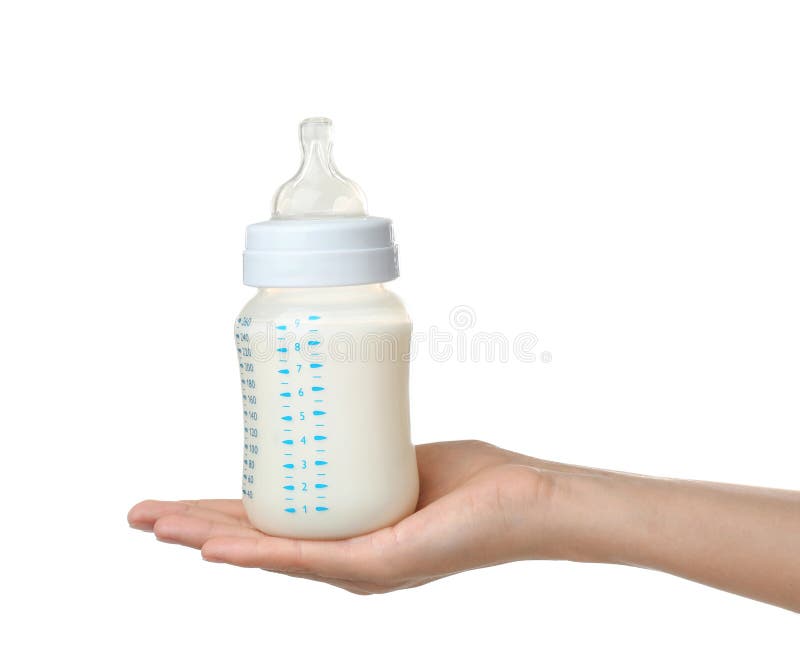 Woman holding baby bottle with milk on white background royalty free stock photos Woman holding baby bottle with milk on white background royalty free stock photos
