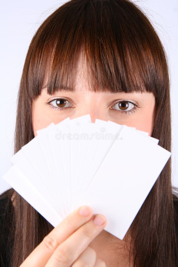 Woman holding blank business cards