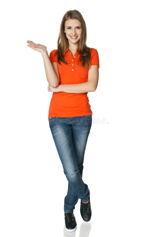 Woman holding blank copy space on her open palm standing in full length