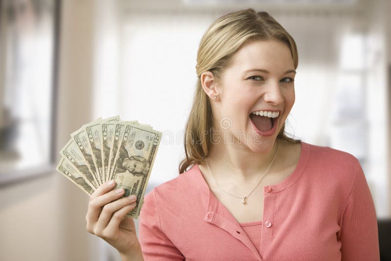 Happy Beautiful Wealthy Young Hispanic Woman Holding Money Editorial
